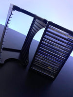 - Porta CDs (para 15 CDs)